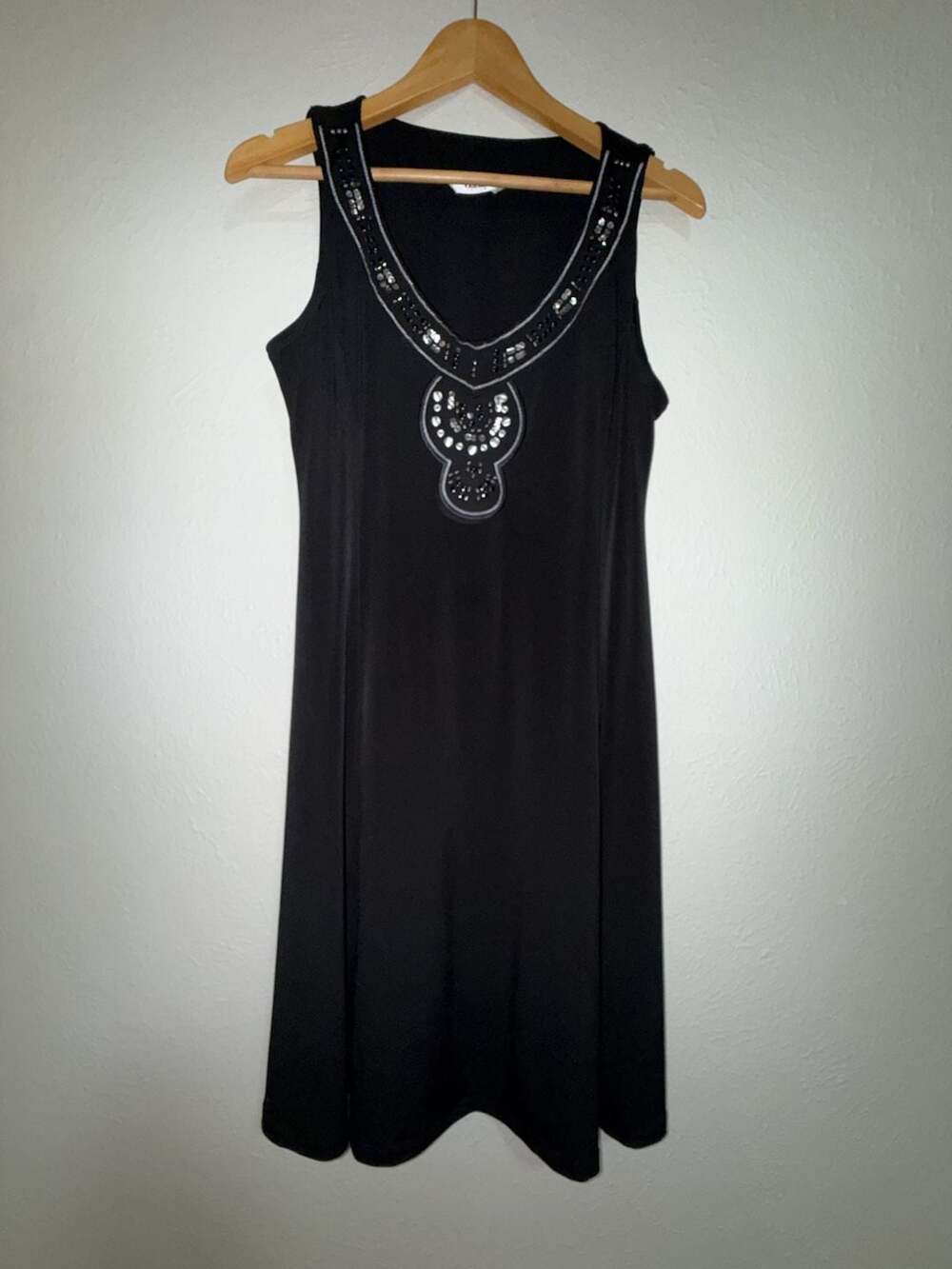 TanJay Sleeveless Black Dress with Beaded and Studded Neckline